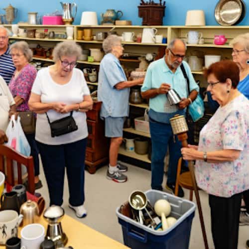A group of diverse senior citizens shopping for household items at Savers, taking advantage of the senior discount policy
