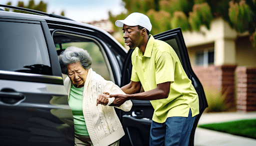 A photo of a rideshare driver assisting a senior passenger, demonstrating the safety and assistance provided by rideshare services
